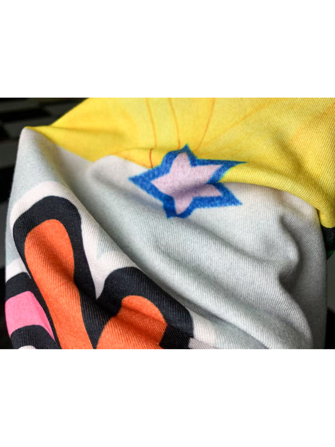 DEADENDKIDS REVERSIBLE ARCHIVE graphic maxi skirt — close modeled view