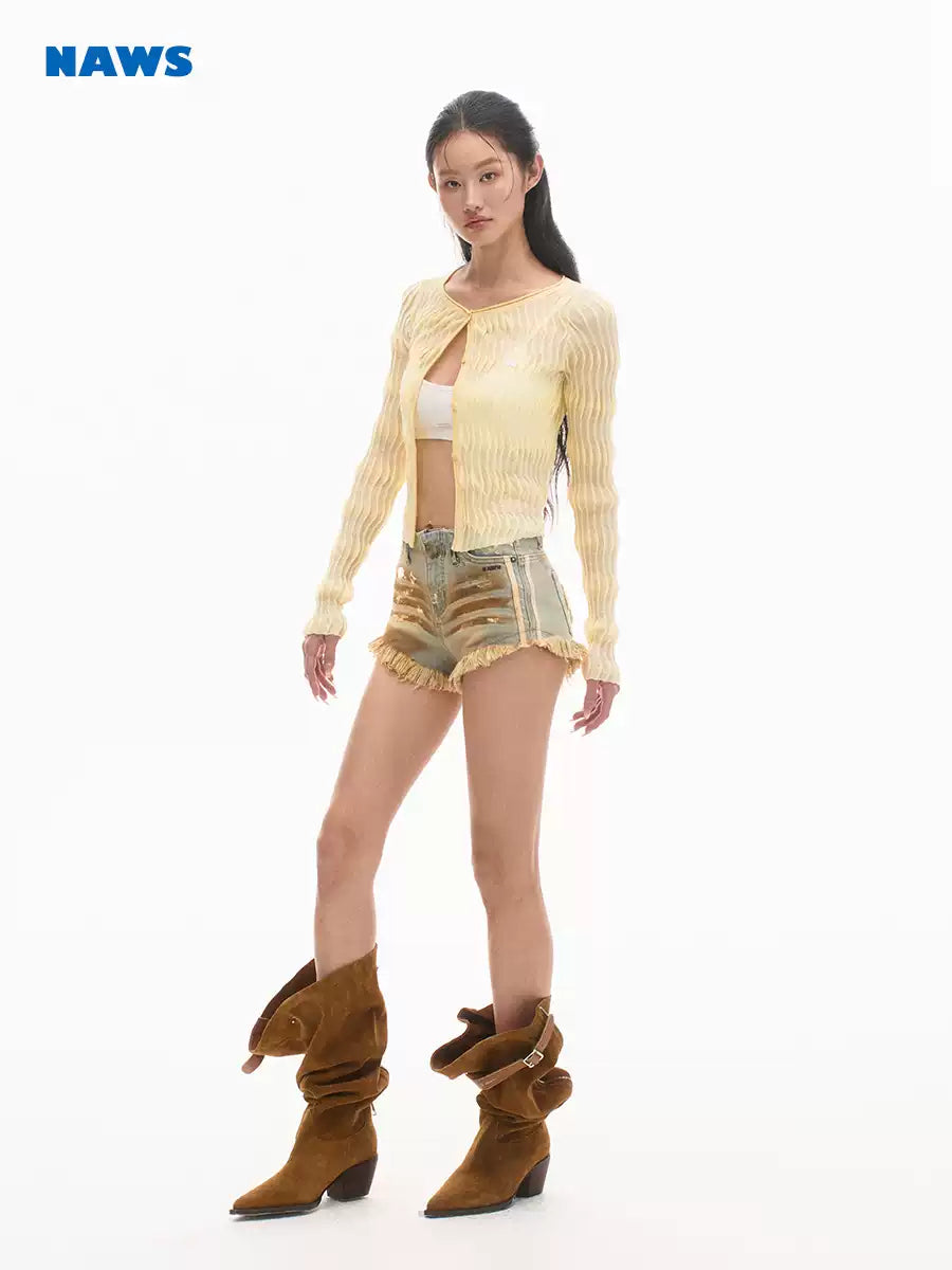 NAWS PYTHON distressed denim shorts — modeled front styling view