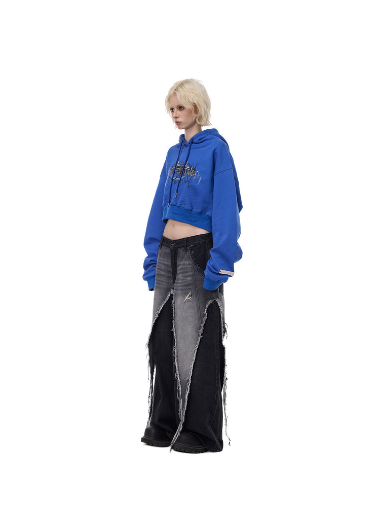 PINKSPINK ELECTRIC MOON reconstructed wide-leg jeans — side full-length styling with blue cropped hoodie