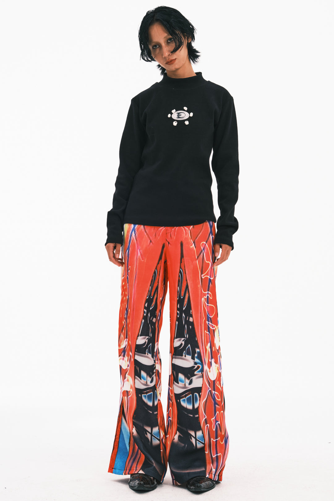 EMBRYO NEURAL FIRE printed flare pants — alternate modeled angle