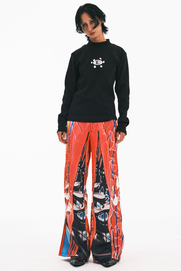 EMBRYO NEURAL FIRE printed flare pants — alternate modeled angle
