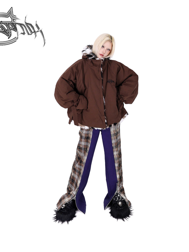 PINKSPINK DNA purple plaid split-panel wide-leg pants — front full-length modeled view styled with a brown padded jacket