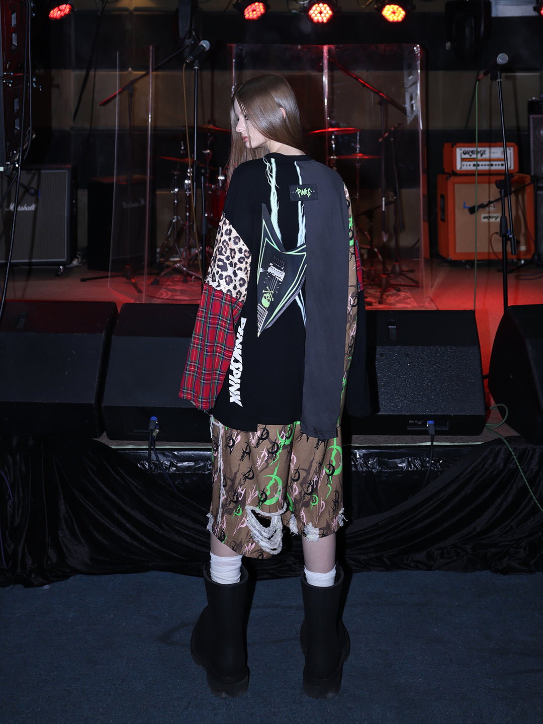 PINKSPINK ELECTRIC MOON distressed camo cropped trousers in CAMOUFLAGE — rear full-body with patchwork top.
