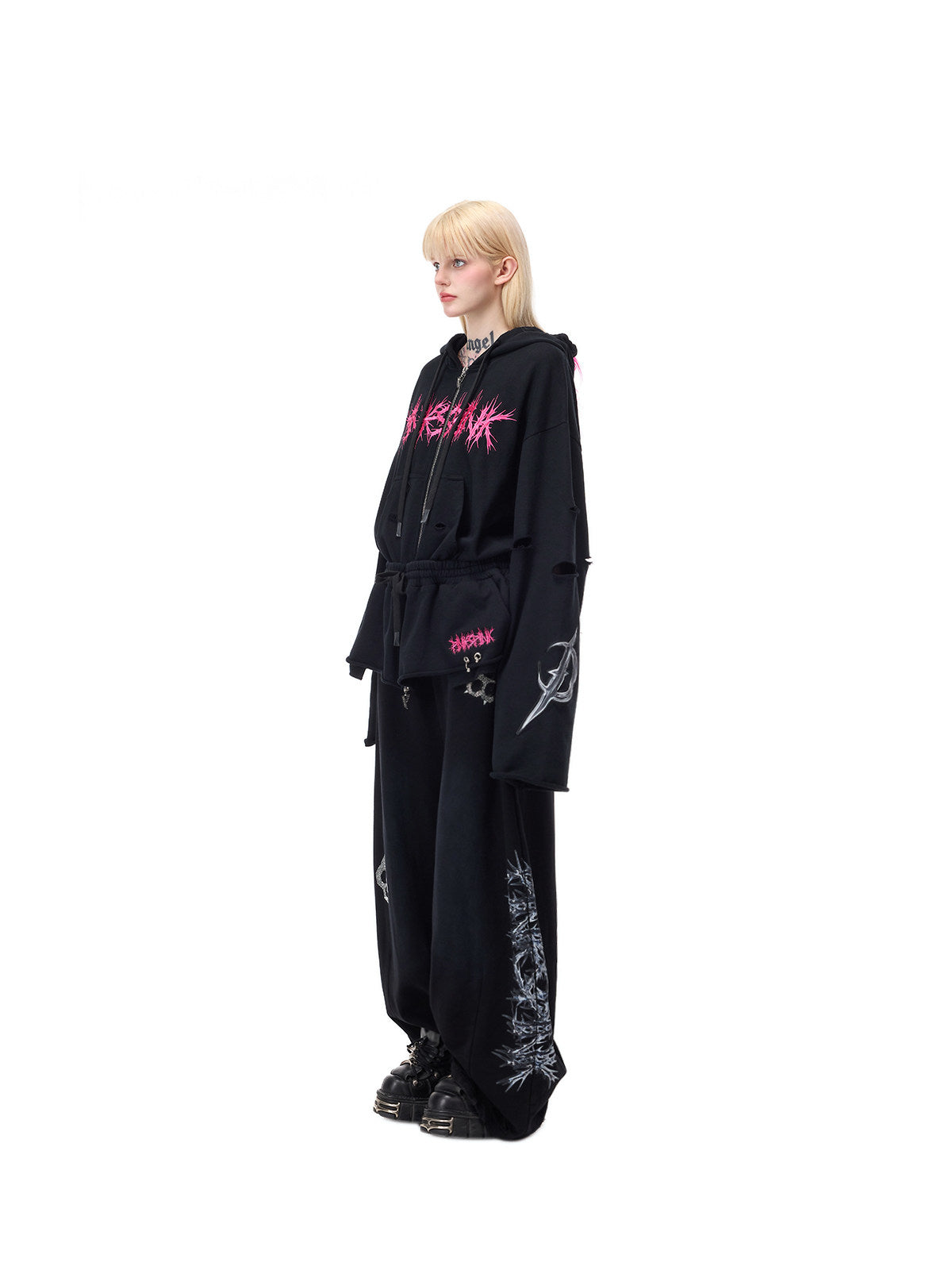 PINKSPINK MOHAWK RITUAL studded zip-up hoodie — side full-length styling with black pants