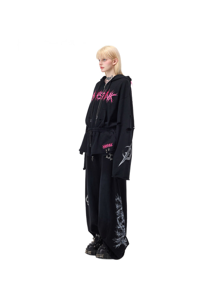 PINKSPINK MOHAWK RITUAL studded zip-up hoodie — side full-length styling with black pants