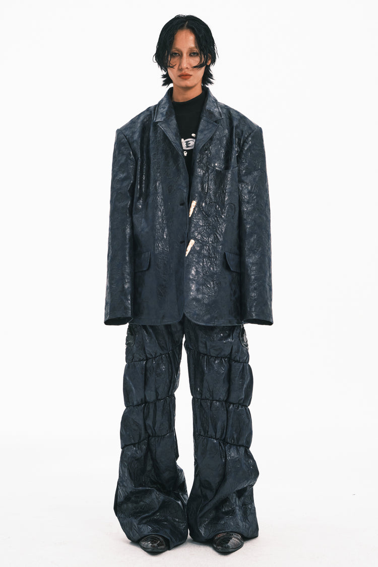 EMBRYO HORN CODE textured PU leather blazer — full-length modeled styling view
