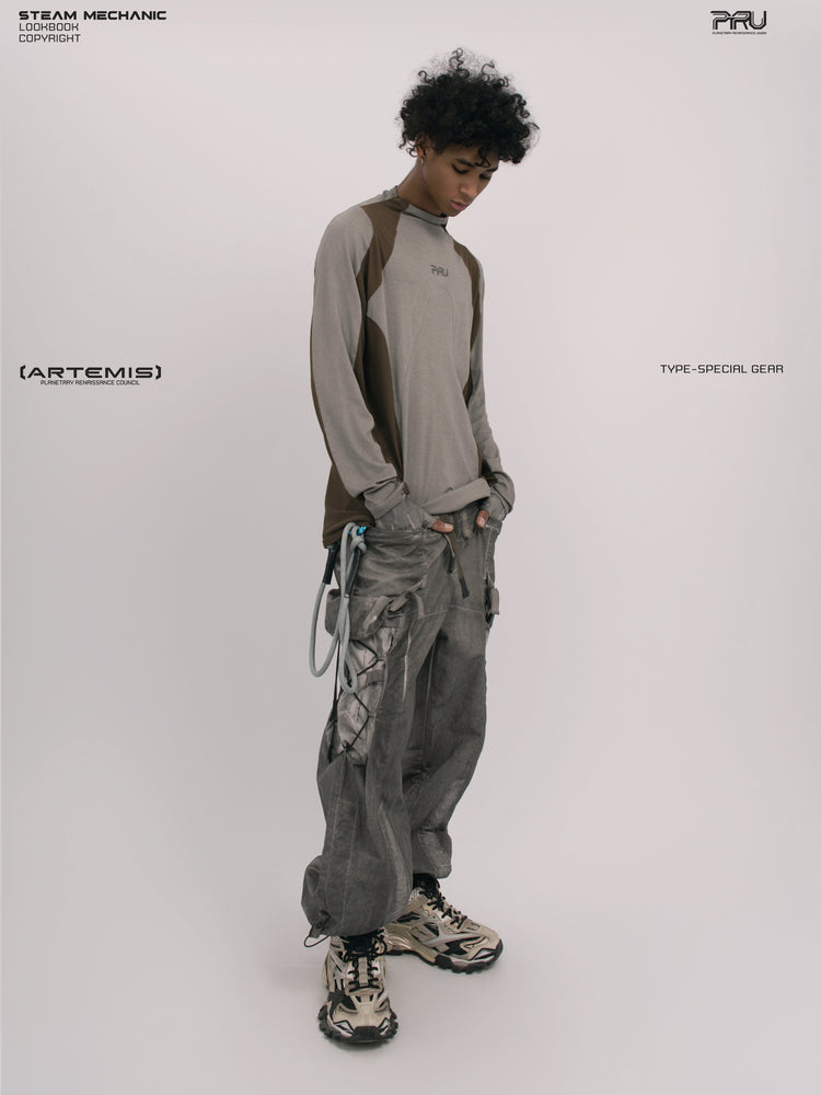 STARCORE ash tundra mesh-panel long-sleeve top b — full-length front three-quarter modeled view looking down