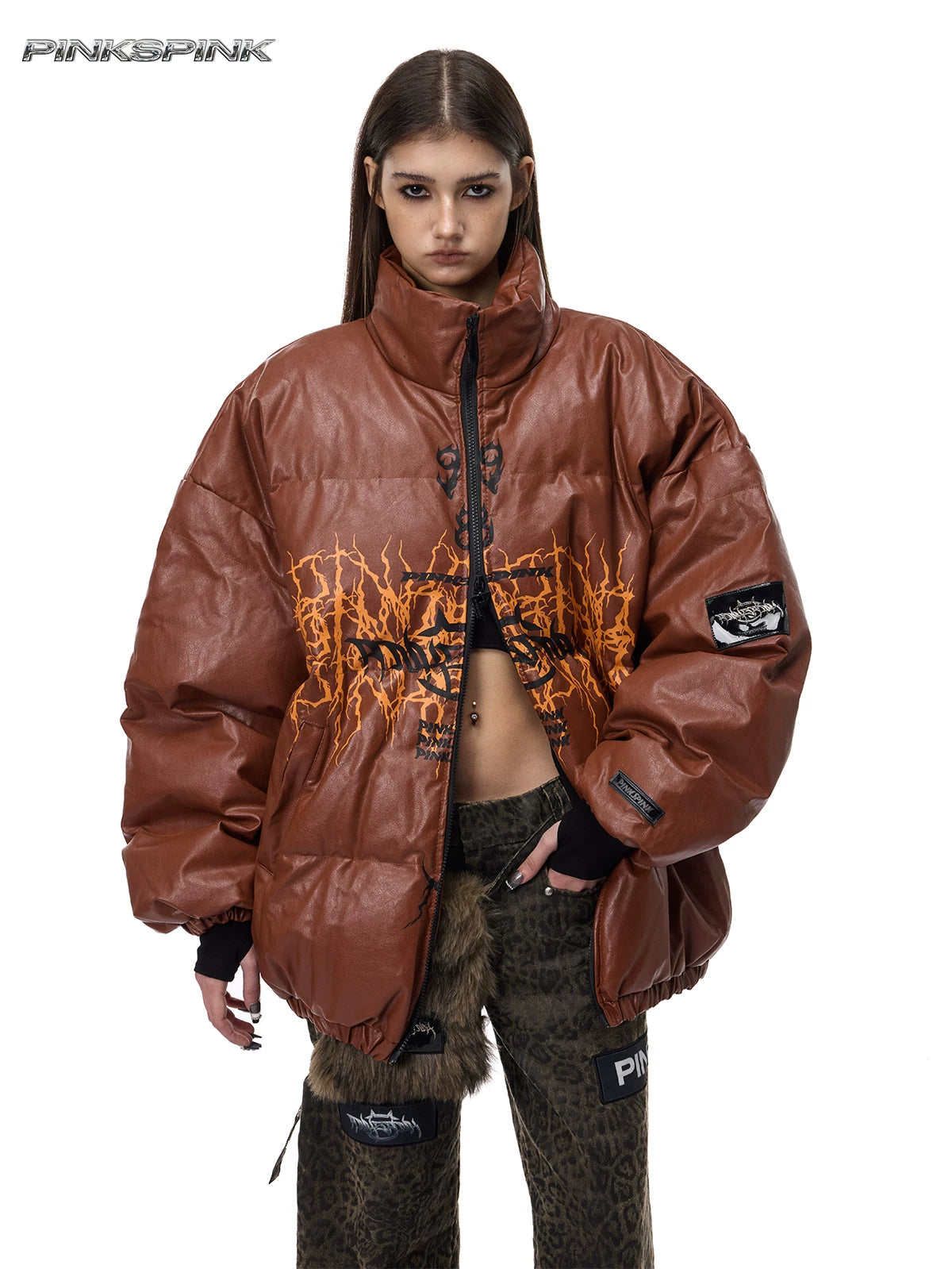 PINKSPINK MOTORBLOC padded faux-leather jacket — caramel brown front modeled view showing chest print