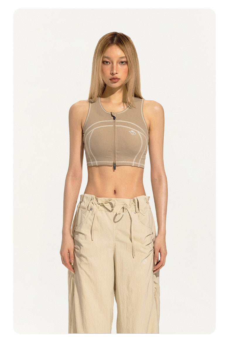 NAWS CLOUD zip-front sports bra — product detail view showing texture and hardware
