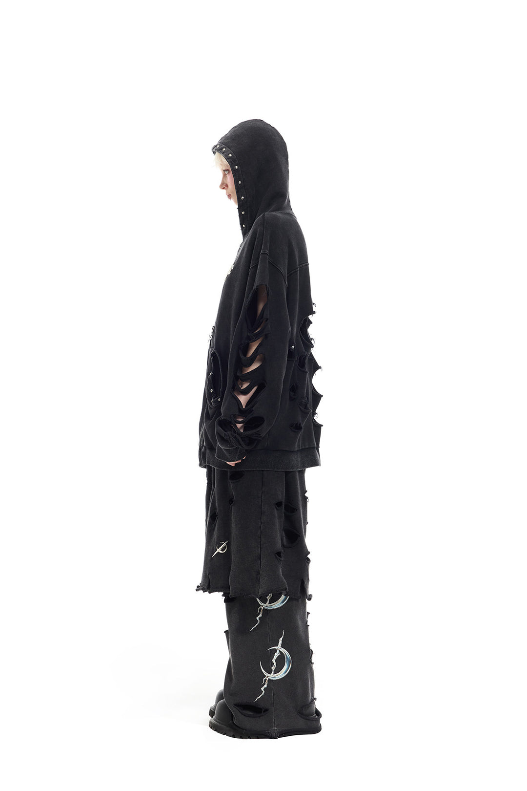 PINKSPINK REMAKE studded distressed zip-up hoodie — modeled detail view of the garment construction