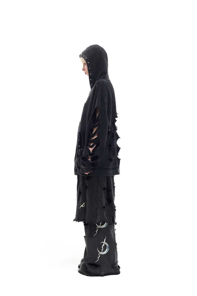 PINKSPINK REMAKE studded distressed zip-up hoodie — modeled detail view of the garment construction