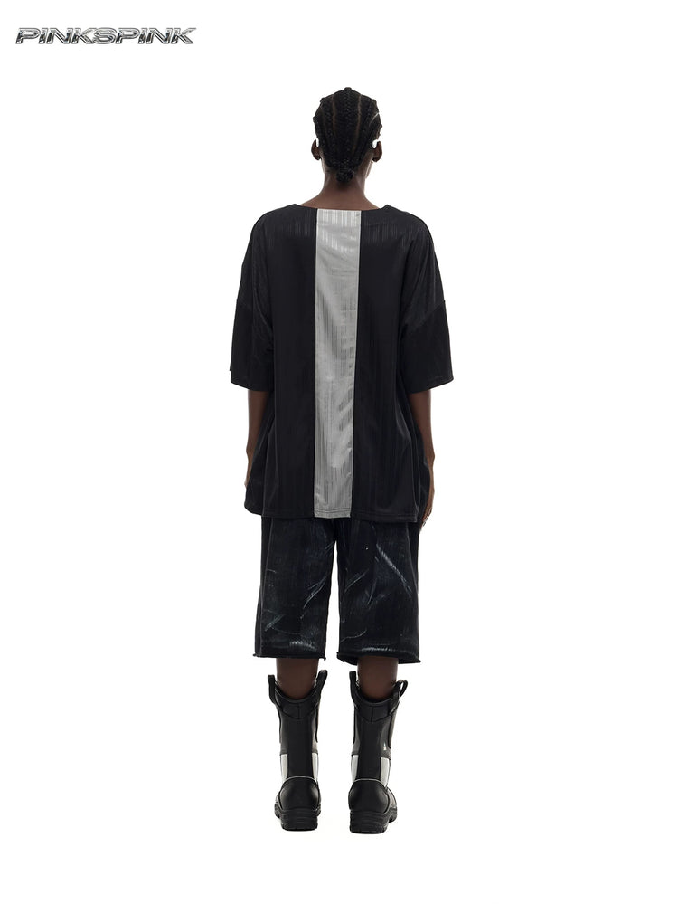 PINKSPINK FLAMECAT oversized sports jersey in black and gray — rear modeled view showing the silver-gray center stripe