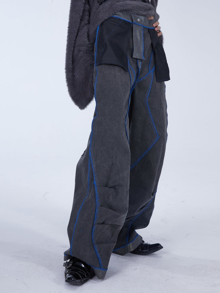 EMBRYO REVERSE CORE metallic canvas wide-leg pants — dark reverse-side angled view