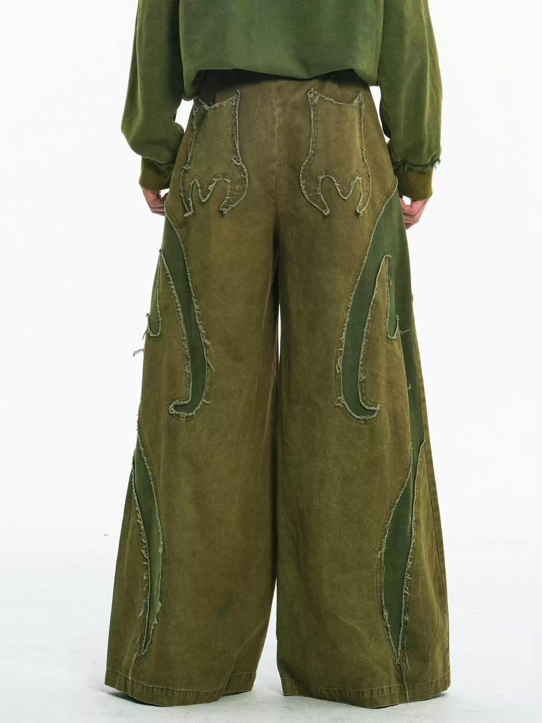 EMBRYO GREEN GUARD distressed wide-leg pants — rear or construction presentation