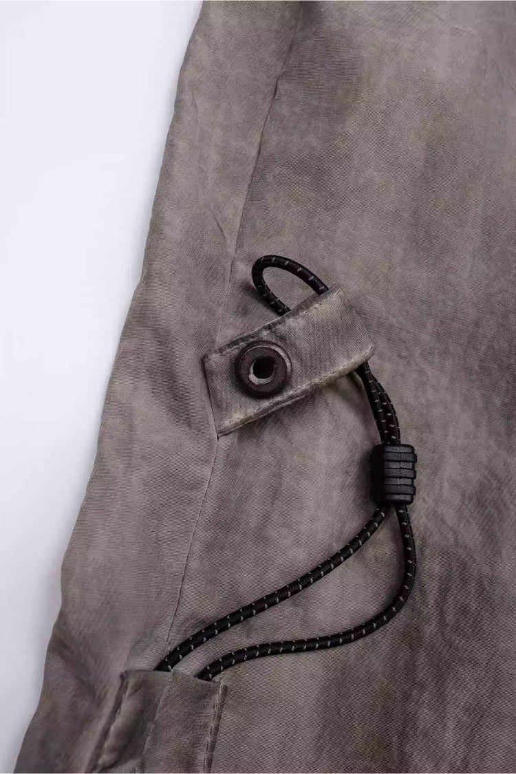 STARCORE mercury brown engineer utility pants — side drawcord and cord lock close-up