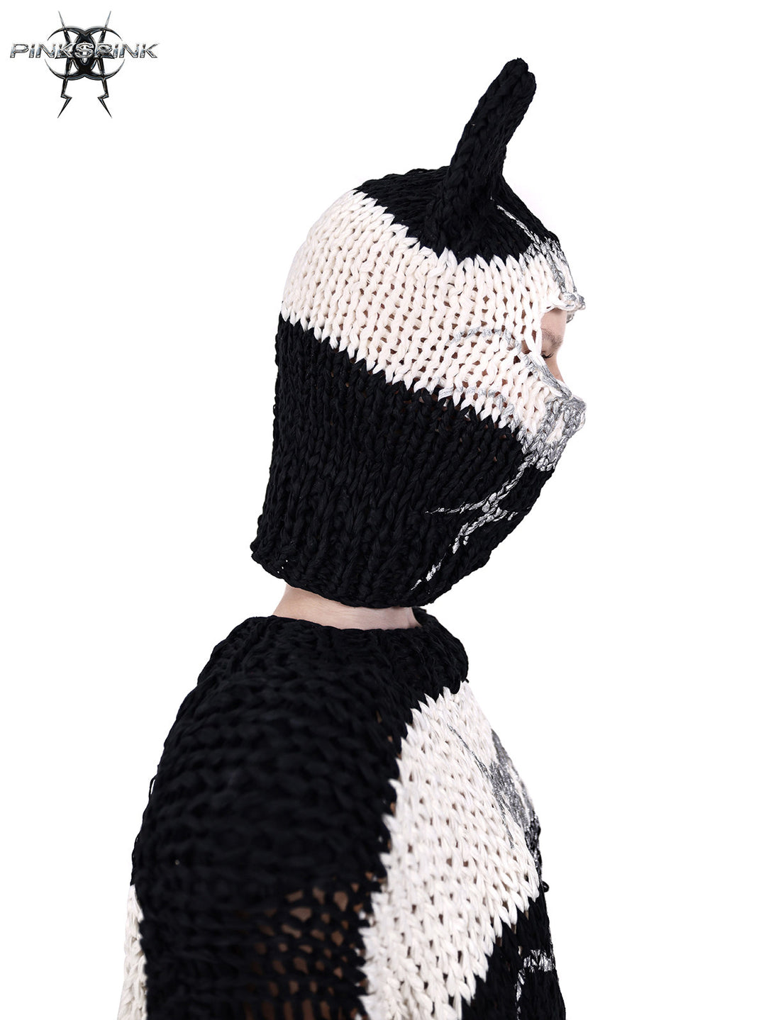 PINKSPINK MIRROR striped open-knit padded-shoulder sweater in black white stripes — profile detail of the open-knit shoulder and neckline
