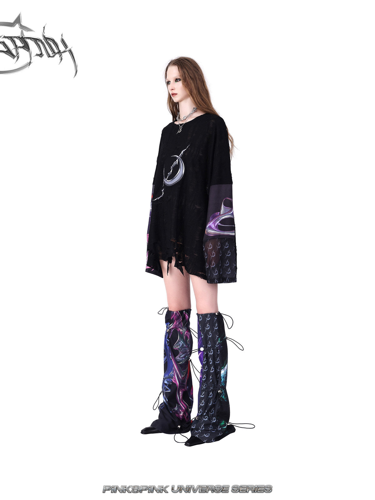 PINKSPINK COSMOS drawcord patchwork leg warmers in black purple multicolor — side modeled view styled with a black tee