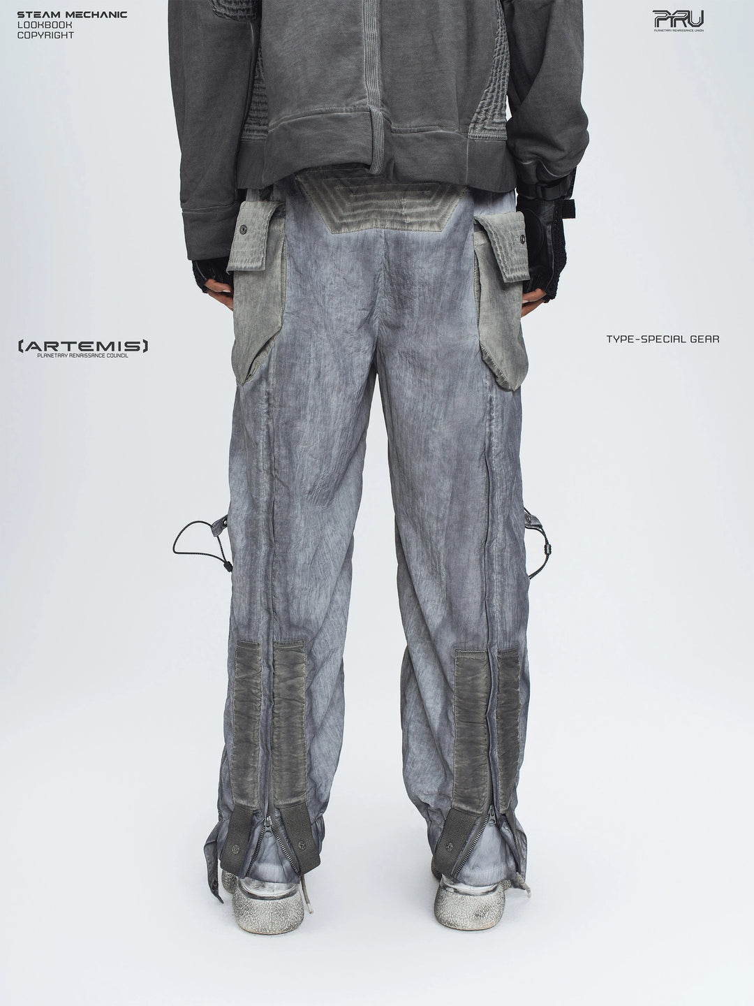 STARCORE moon dust gray engineer utility pants — rear modeled view