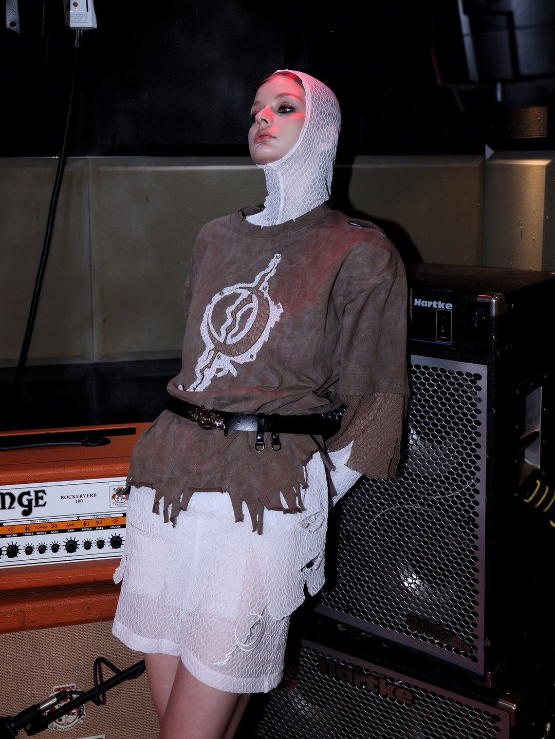 PINKSPINK ELECTRIC MOON triple-layer distressed mesh tee — modeled detail view of the garment construction