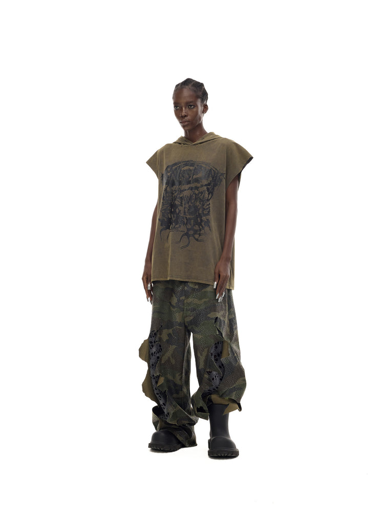 PINKSPINK COSMOS washed sleeveless hooded tee in olive green — front full-length modeled view without a jacket