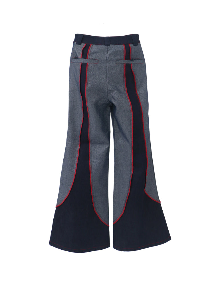 EMBRYO STARSHIFT patchwork flare jeans — rear modeled view