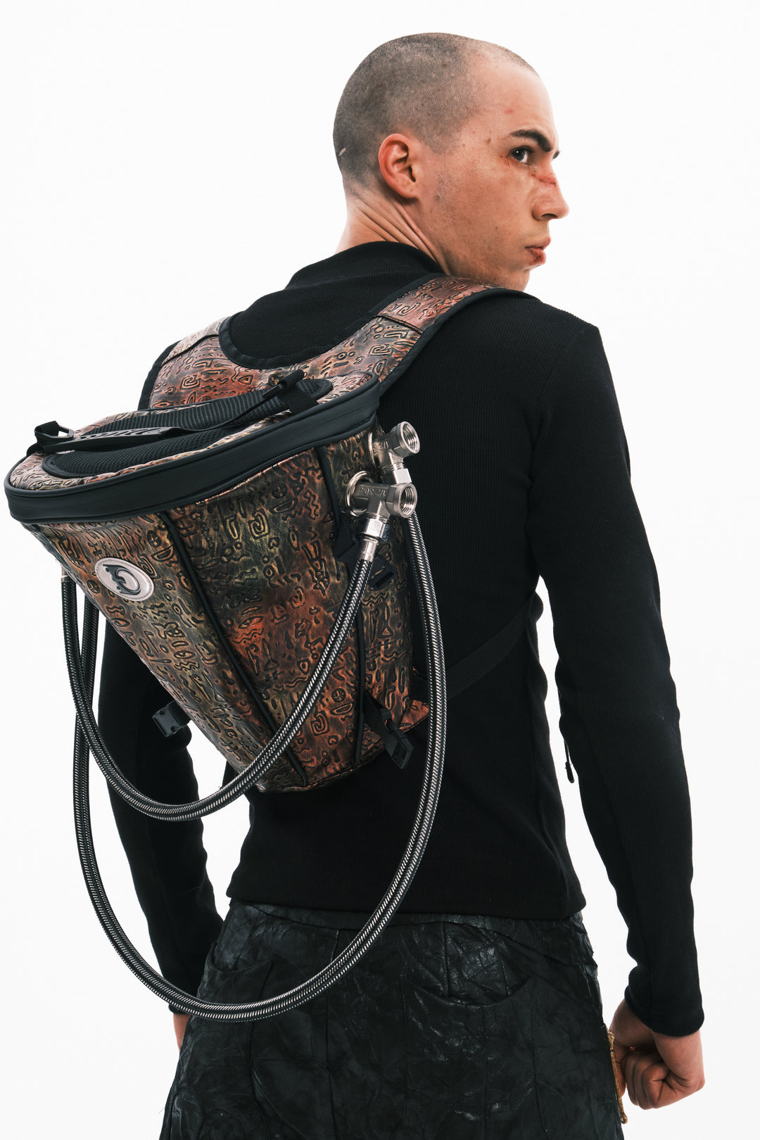EMBRYO ORACLE embossed backpack — garment-only view