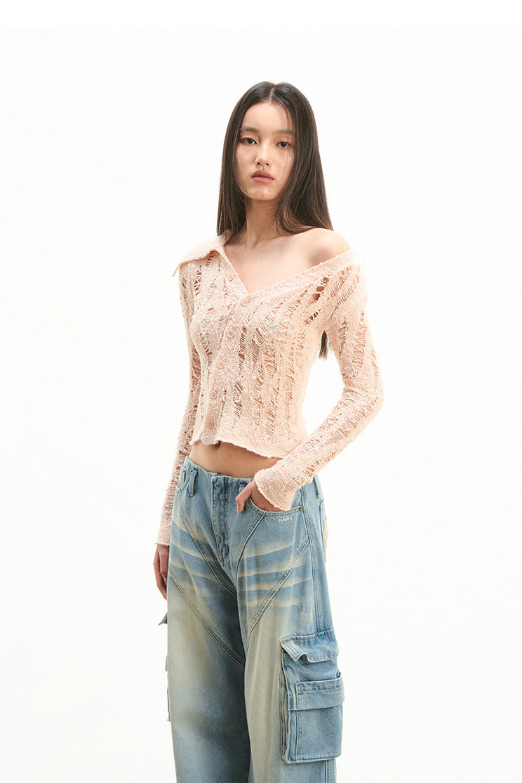 NAWS NOMAD asymmetric cutout knit cardigan — catalog view showing the design and silhouette