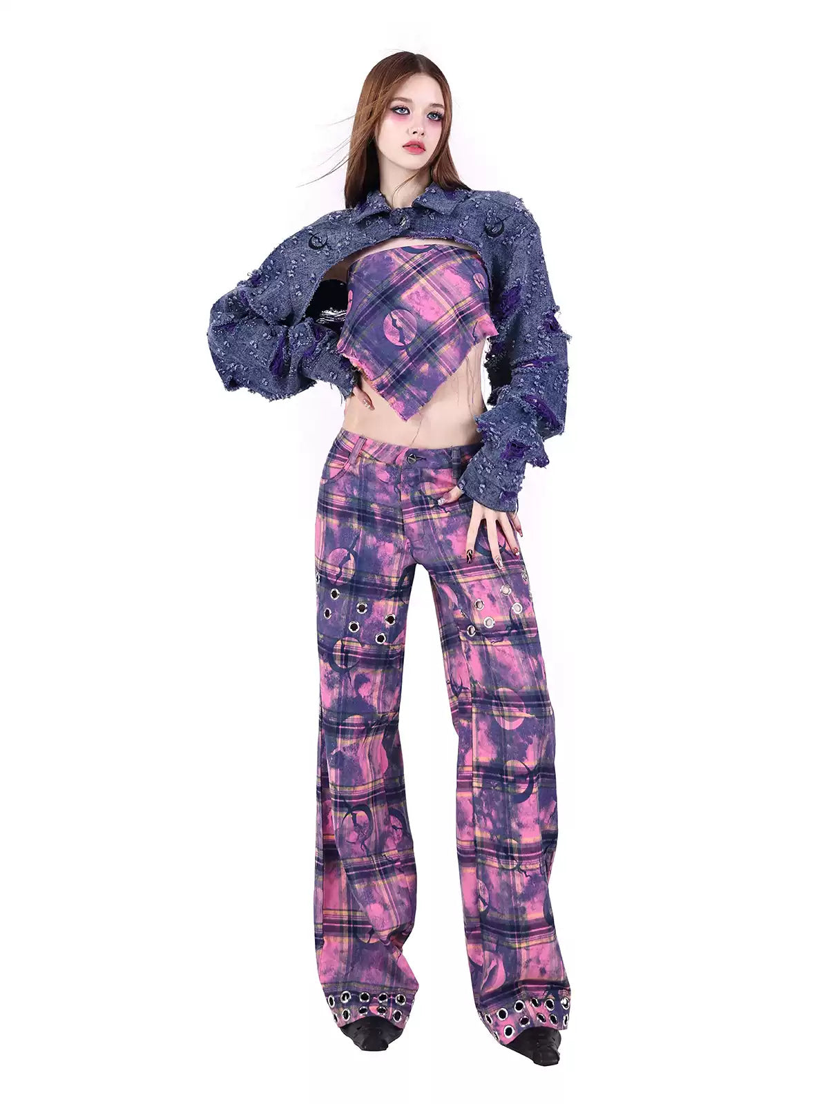 PINKSPINK ELECTRIC MOON wasteland plaid straight-leg pants — close modeled view highlighting the construction