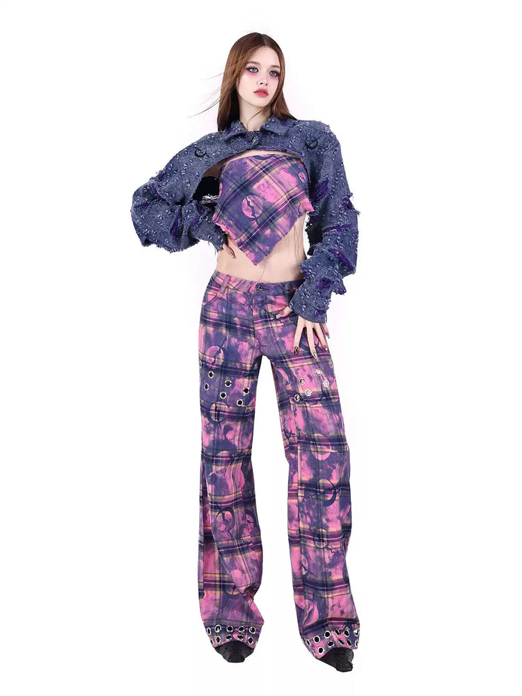 PINKSPINK ELECTRIC MOON wasteland plaid straight-leg pants — close modeled view highlighting the construction