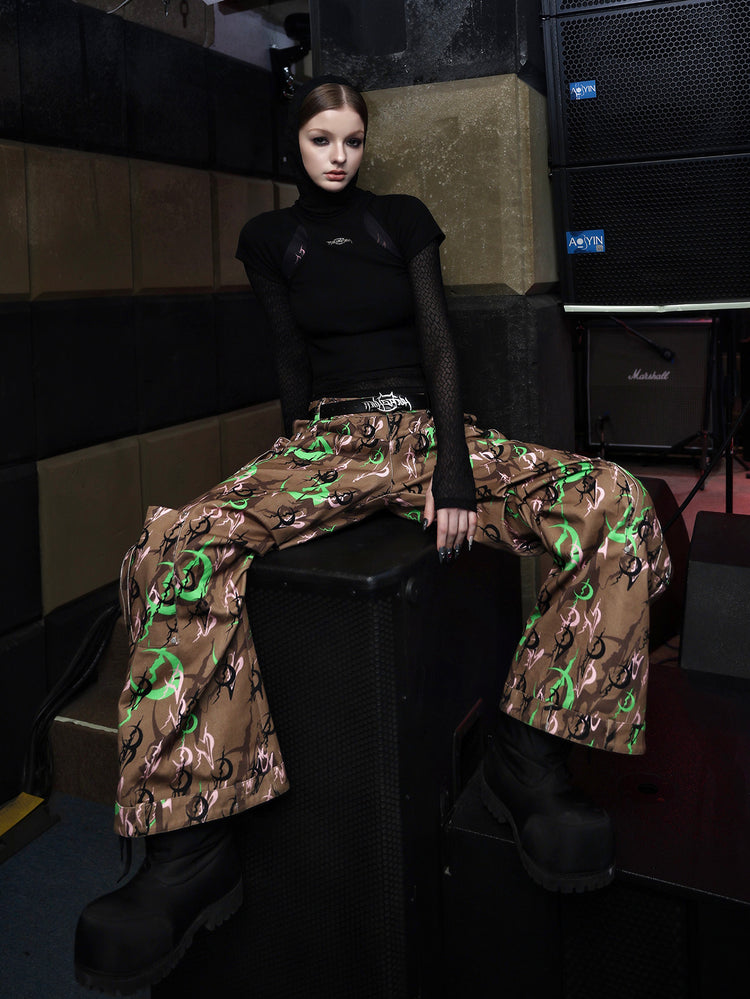 PINKSPINK ELECTRIC MOON fitted mesh crop tee — seated modeled view layered over sheer mesh