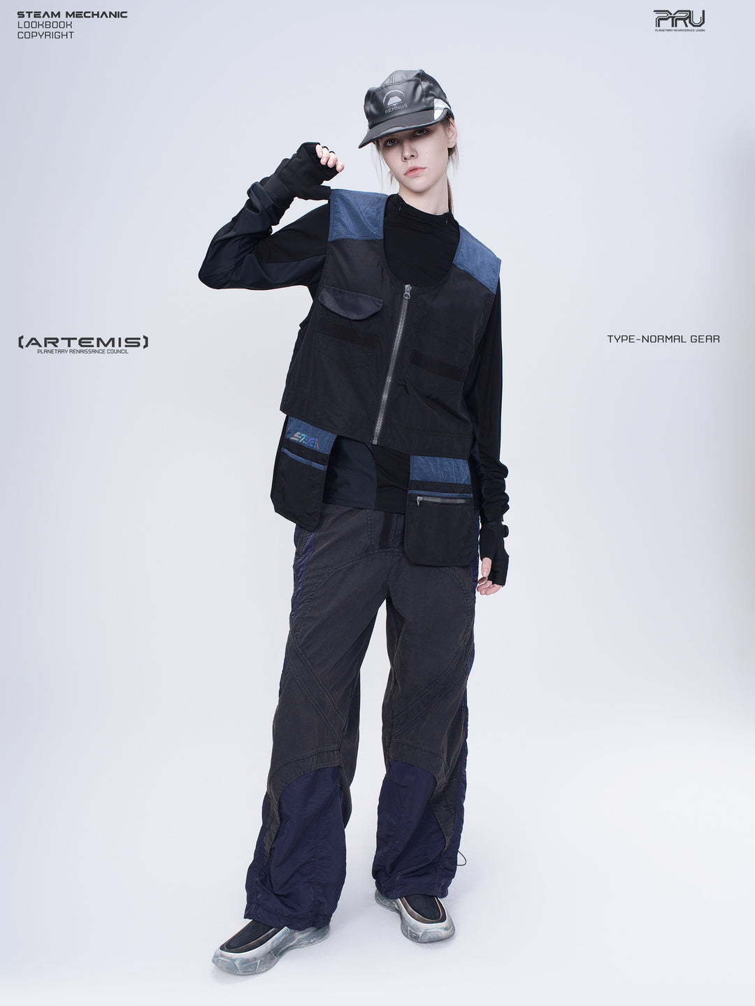 SUPERNOVA zima blue metallic nylon technical pants — full-length modeled front view with a raised hand