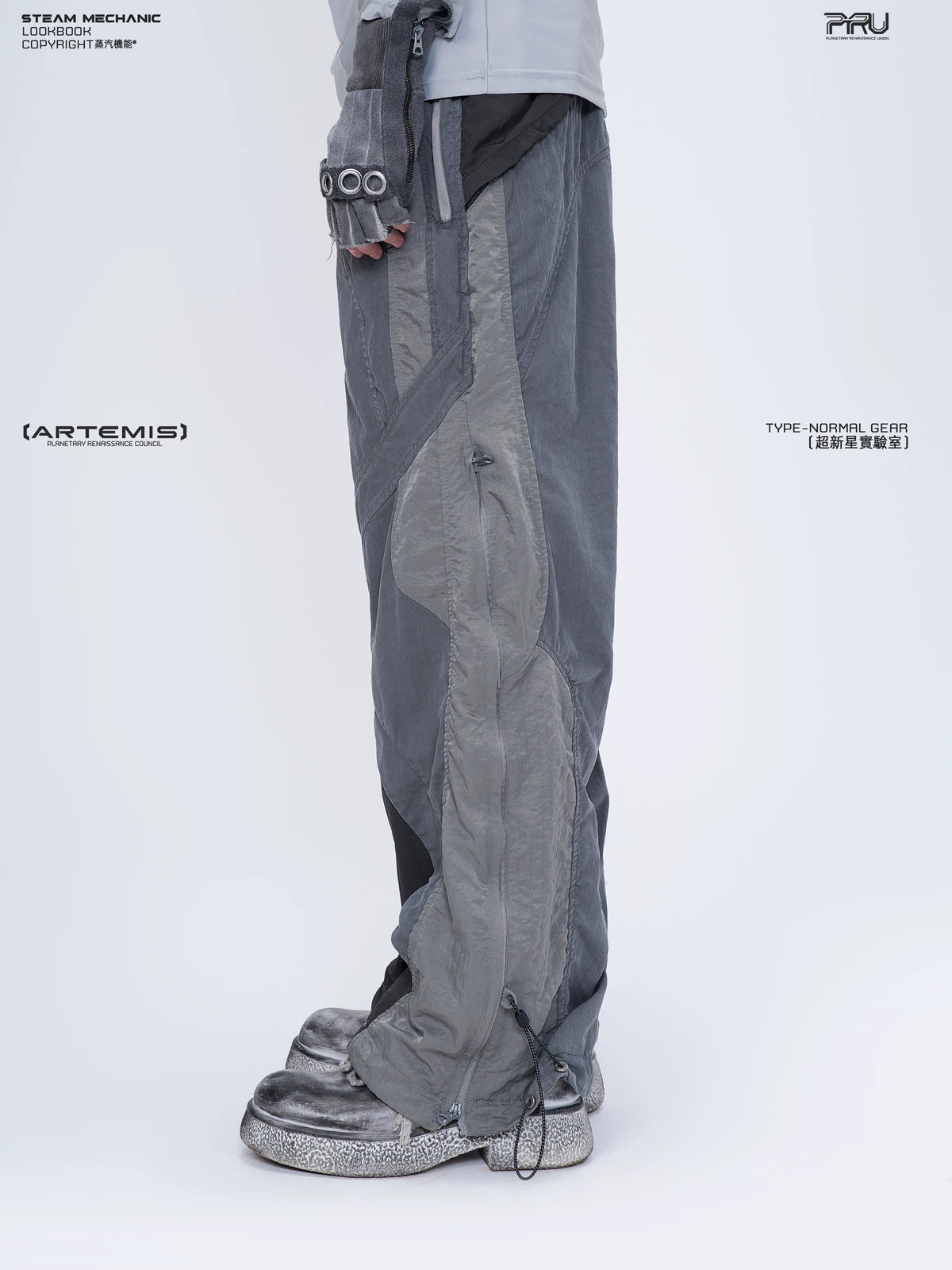 SUPERNOVA alloy gray metallic nylon technical pants — rear modeled view