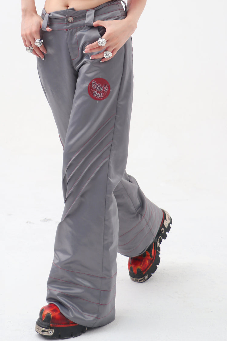 EMBRYO STARSHIFT ruched 3D-effect pants — close modeled view