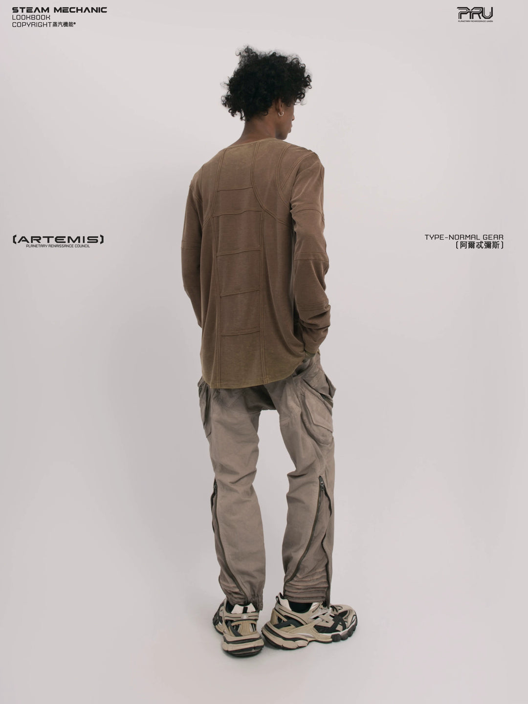 RUSTED ORBIT petrified brown mesh-panel long-sleeve top — material and silhouette detail