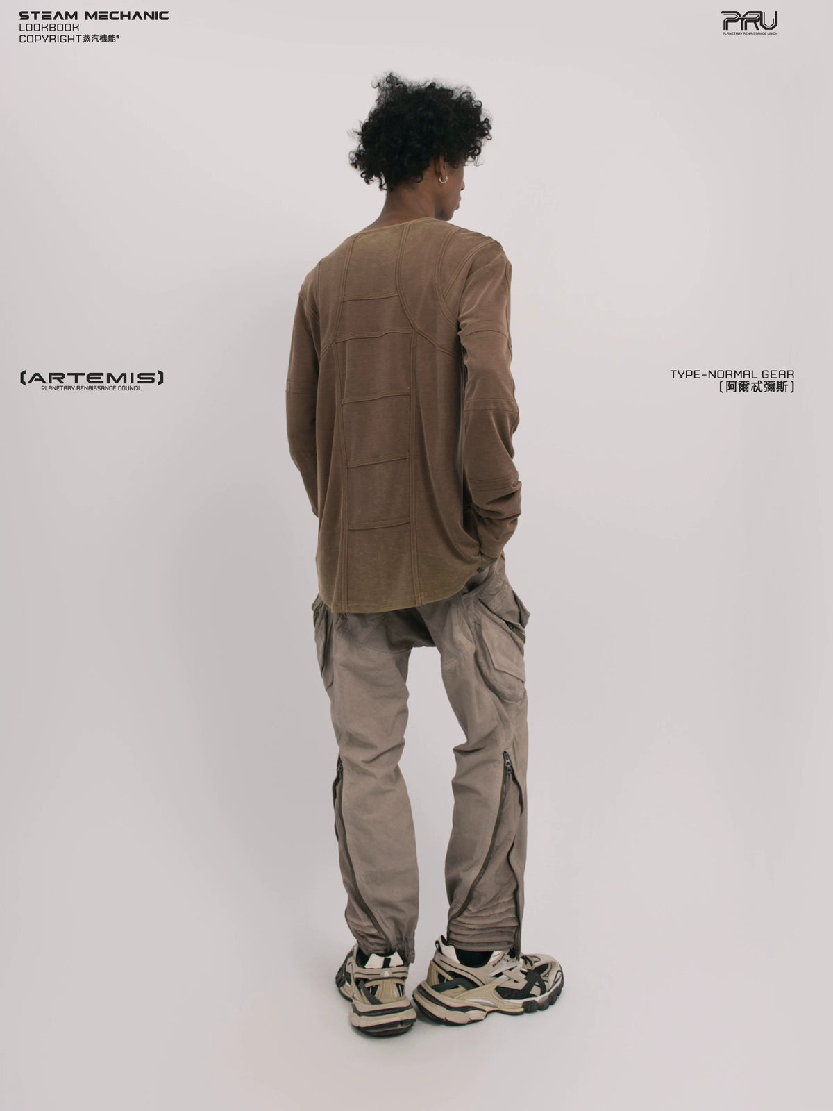 RUSTED ORBIT petrified brown mesh-panel long-sleeve top — material and silhouette detail