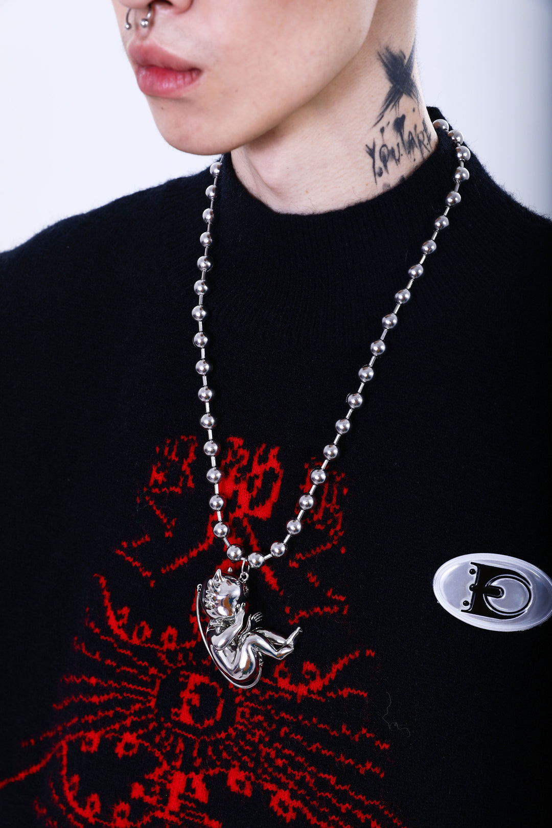 EMBRYO DEVIL CHILD sculptural pendant necklace — front product presentation