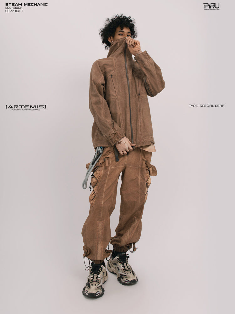 ARTEMIS soft dawn orange tuck-paneled technical jacket — full-length modeled view holding the collar up