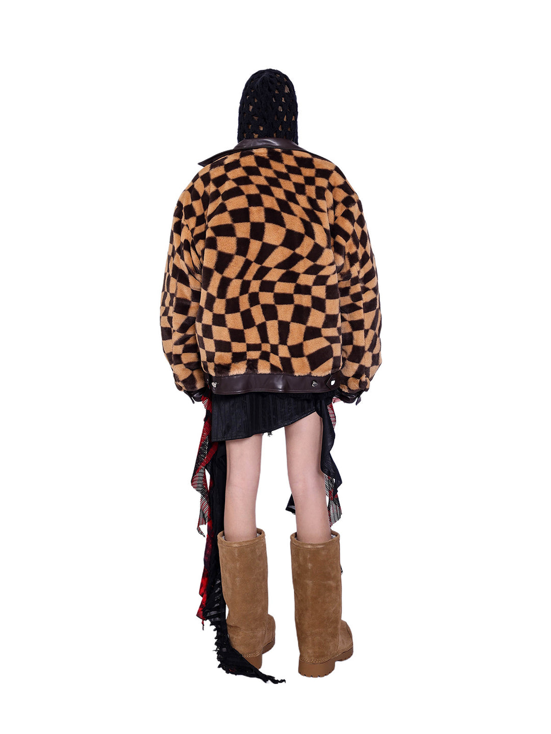 PINKSPINK WARPED checkerboard padded faux-fur jacket — caramel brown checkerboard jacket — back view over a black hooded layer