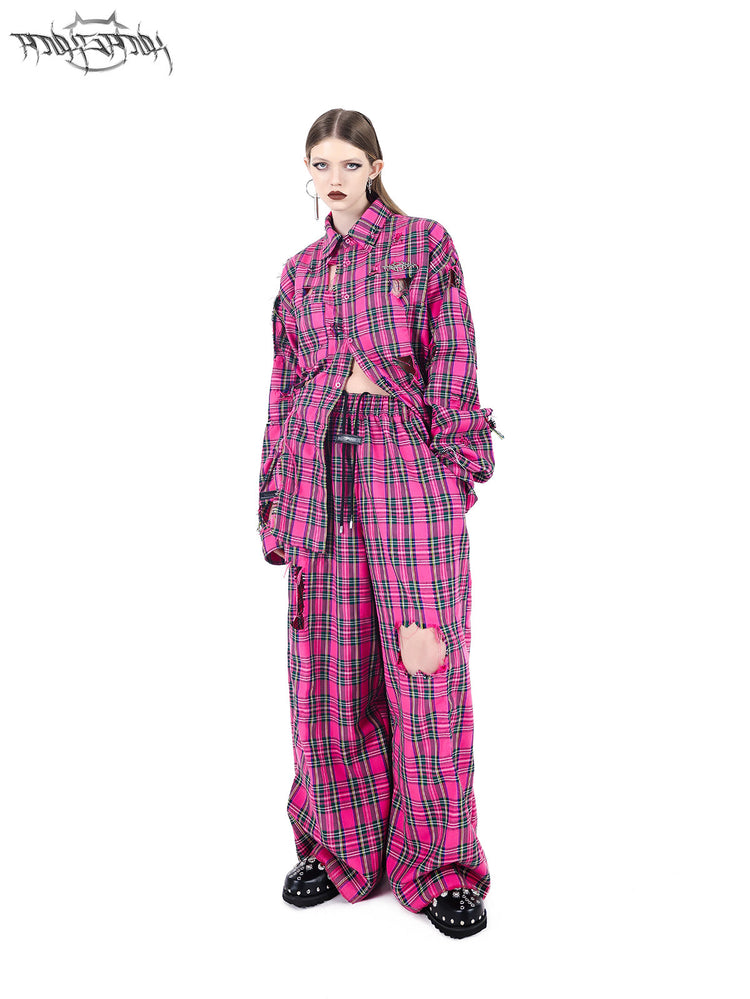 PINKSPINK PINK RIOT distressed plaid wide-leg pants — pink plaid three-quarter front view with coordinating shirt