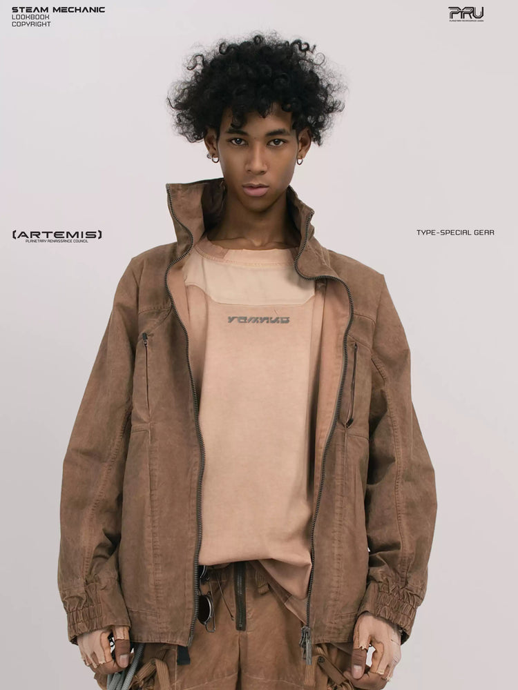 ARTEMIS soft dawn orange tuck-paneled technical jacket — front modeled close-up with jacket open