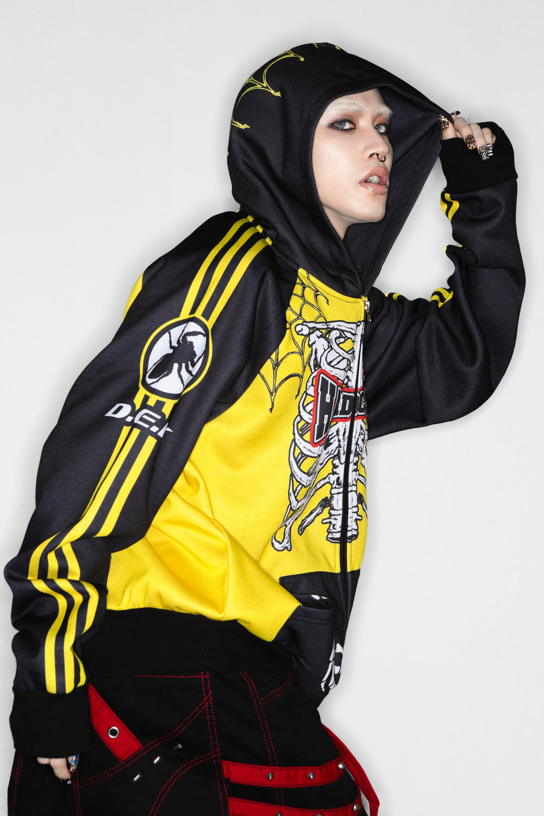 DeadEndKids Hardcore Generation skeleton zip-up hoodie — modeled side, hood up