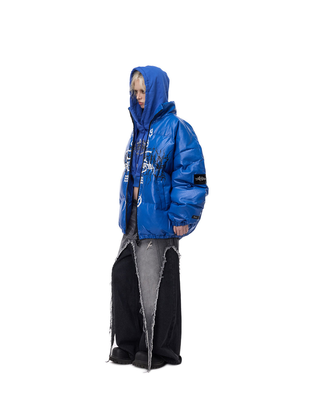 PINKSPINK MOTORBLOC padded faux-leather jacket — Klein blue side styling view over a separate hoodie