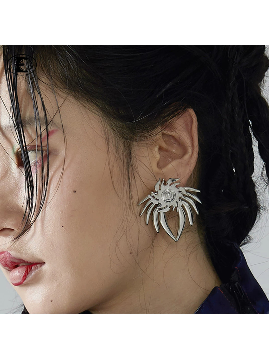 EMBRYO CURSE rotating sunflower earrings — front product presentation