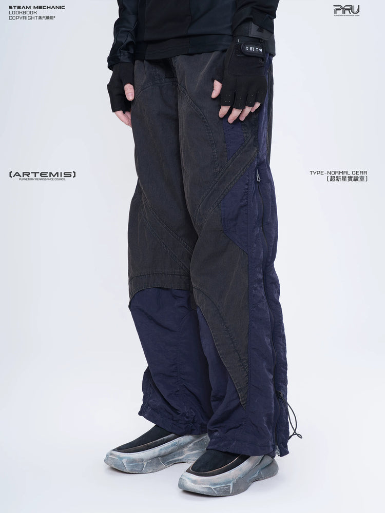 SUPERNOVA zima blue metallic nylon technical pants — alternate modeled angle