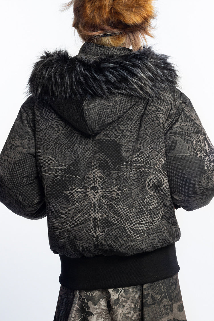 4RE1GN GOTHIC down jacket in charcoal ornamental print — Back close-up showing hood and ornamental wing-like print.