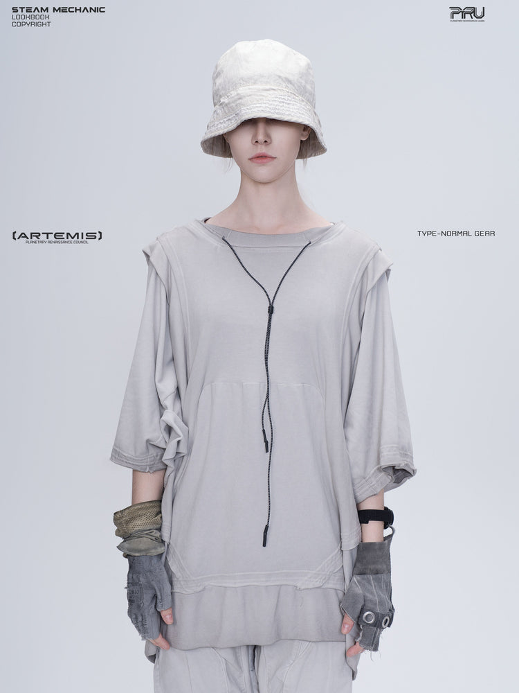 PIONEER eris white distressed nylon bucket hat — front modeled view showing the hat with a pale outfit