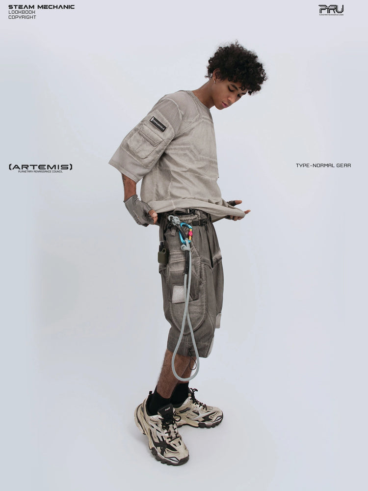 STARCORE xirang brown velcro mesh tee — full-length side modeled view holding the hem