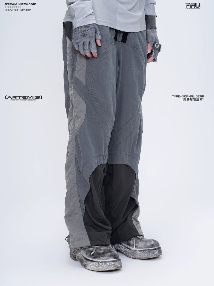 SUPERNOVA alloy gray metallic nylon technical pants — side modeled view