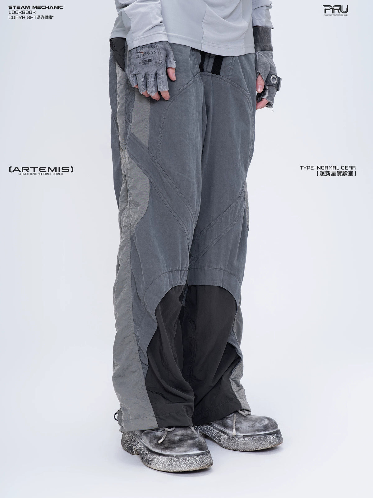 SUPERNOVA alloy gray metallic nylon technical pants — side modeled view