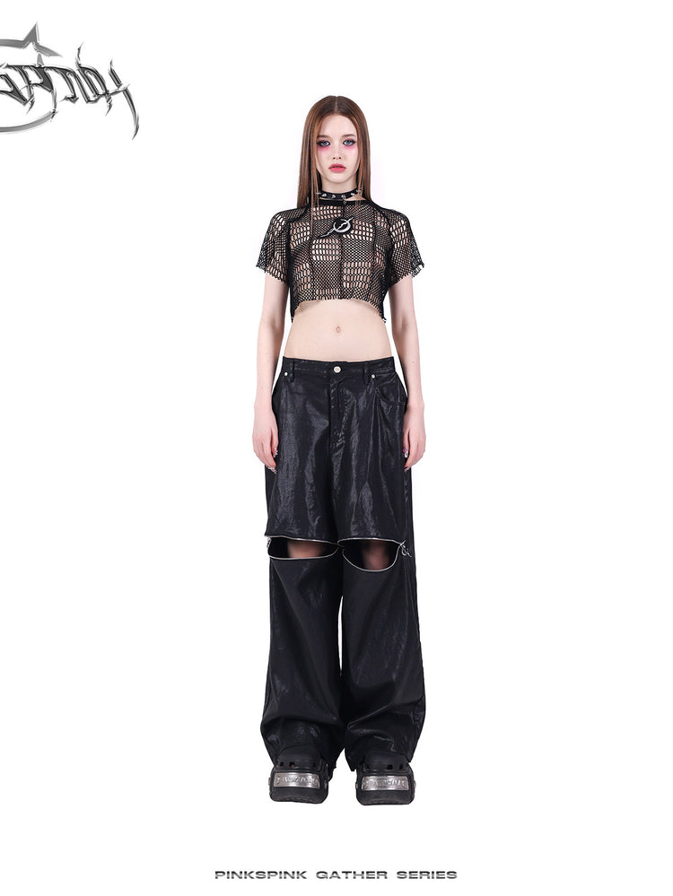 PINKSPINK GEOMETRY open-mesh crop tee in black — front full-length modeled view styled with coated pants